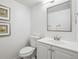 Clean bathroom features a modern vanity, framed mirror, and sleek fixtures at 1470 S Quebec Way # 83, Denver, CO 80231