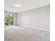 Bedroom with sliding door to patio at 1470 S Quebec Way # 83, Denver, CO 80231