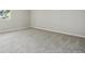 Neutral bedroom with carpeted floor and base trim at 1470 S Quebec Way # 83, Denver, CO 80231