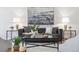 Cozy living room showcasing a modern sofa, stylish decor, and ambient lighting at 1470 S Quebec Way # 83, Denver, CO 80231