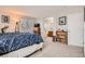 Spacious main bedroom with ensuite bathroom and generous natural light at 9615 Lansing Cir, Commerce City, CO 80022