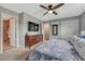 Bedroom with ceiling fan and a full ensuite bathroom at 5071 S Boston St, Greenwood Village, CO 80111
