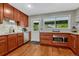 Updated kitchen featuring granite countertops, wood floors and stainless steel appliances at 5071 S Boston St, Greenwood Village, CO 80111