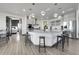 Large kitchen island with seating and stainless steel appliances, perfect for entertaining at 11680 Imboden Rd, Hudson, CO 80642