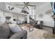 Bright, open-concept living room featuring modern decor, high ceilings, and a spacious layout at 11680 Imboden Rd, Hudson, CO 80642
