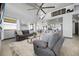 Spacious living room with large windows, modern furnishings and high ceilings at 11680 Imboden Rd, Hudson, CO 80642