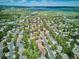 Scenic aerial view of a residential neighborhood with lake views, highlighting the property's location at 5331 S Geneva Way, Englewood, CO 80111