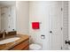 Bright bathroom featuring a granite-topped vanity and tiled shower with modern fixtures at 5331 S Geneva Way, Englewood, CO 80111