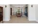 Elegant dining room features classic chandelier and large window to backyard at 5331 S Geneva Way, Englewood, CO 80111