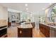 Spacious open concept kitchen with island cooktop and a breakfast nook at 5331 S Geneva Way, Englewood, CO 80111