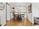 Dining room featuring a round table with hardwood floors at 4909 W Mississippi Ave, Denver, CO 80219