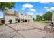 Exterior of townhome complex with multiple parking garages and shared open lot at 8738 Chase Dr # 134, Arvada, CO 80003