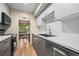 Modern kitchen features stainless steel appliances, sleek countertops, and ample cabinet space at 8738 Chase Dr # 134, Arvada, CO 80003