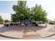The Lake Arbor Golf Club entrance is adorned with lush landscaping, offering a welcoming view to members and guests at 8738 Chase Dr # 134, Arvada, CO 80003