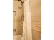 Bathroom with a modern tiled shower and sleek shower head at 23778 Inca Rd, Indian Hills, CO 80454