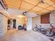 Spacious garage with visible ceiling supports offers generous storage space at 23778 Inca Rd, Indian Hills, CO 80454