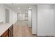 Spacious finished basement with recessed lighting and open layout, perfect for entertaining at 4130 Umatilla St, Denver, CO 80211