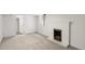 Finished basement with a decorative fireplace and access to other rooms at 4130 Umatilla St, Denver, CO 80211