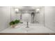 Bright bathroom featuring vanity with modern fixtures and large mirror at 4130 Umatilla St, Denver, CO 80211