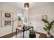 Stylish home office with modern desk, decor, and bright natural light; perfect workspace at 4130 Umatilla St, Denver, CO 80211