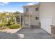 Charming two-story home featuring an attached single-car garage, well-kept lawn, and garden area at 15157 E Nassau Ave, Aurora, CO 80014