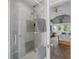 Modern shower with sleek tile and glass enclosure, offering a luxurious bathing experience at 15157 E Nassau Ave, Aurora, CO 80014