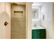 Refined bathroom featuring sleek shower and modern vanity offers a spa-like experience at 1488 S Biscay Ct, Aurora, CO 80017
