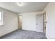 Comfortable bedroom with plush carpet, neutral walls and closet at 1488 S Biscay Ct, Aurora, CO 80017