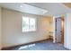 Bright bedroom with large window, closet and neutral decor offers a peaceful retreat at 1488 S Biscay Ct, Aurora, CO 80017