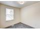Bedroom with plush carpet, window view and neutral walls at 1488 S Biscay Ct, Aurora, CO 80017