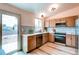 Modern kitchen featuring stainless steel appliances and plenty of counter space at 1488 S Biscay Ct, Aurora, CO 80017