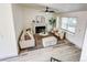 Bright living room with a fireplace, neutral decor, and ample natural light at 1488 S Biscay Ct, Aurora, CO 80017