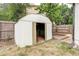 Outdoor shed with open door, offers plenty of storage at 1488 S Biscay Ct, Aurora, CO 80017