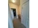 Hallway with doorway and a small desk or counter space at 8520 S Holland Ln # 302, Littleton, CO 80128