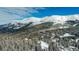 Aerial view of homes in a snowy mountain community at 229 Lee Ln, Breckenridge, CO 80424