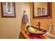 Upscale bathroom with vessel sink and wooden vanity at 229 Lee Ln, Breckenridge, CO 80424