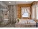 Modern bathroom with a large walk-in shower and a spacious soaking tub at 229 Lee Ln, Breckenridge, CO 80424