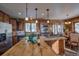 Gourmet kitchen boasts a large island and stainless steel appliances at 229 Lee Ln, Breckenridge, CO 80424