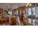 Open kitchen with custom cabinetry, island, and breakfast nook at 229 Lee Ln, Breckenridge, CO 80424