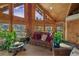 Living room with vaulted ceiling, mountain views, and cozy seating at 229 Lee Ln, Breckenridge, CO 80424