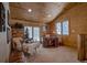 Cozy office loft with large windows and a wood paneled ceiling at 229 Lee Ln, Breckenridge, CO 80424