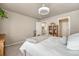 Bright bedroom with a comfortable bed and ample closet space at 16023 E Warner Pl, Denver, CO 80239