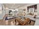 Open concept dining area with table and chairs near kitchen at 16023 E Warner Pl, Denver, CO 80239