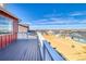 View from the deck of the neighborhood and the sky at 8724 Big Thompson St, Littleton, CO 80125