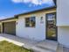 Close up of the front entrance, garage and updated features of this home at 2830 E 99Th Way, Thornton, CO 80229
