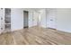 Spacious main bedroom with wood flooring and access to a modern bathroom, offering a luxurious retreat at 2830 E 99Th Way, Thornton, CO 80229