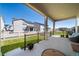 View from the covered patio showing a fenced in lawn at 5925 La Posada Pl, Parker, CO 80134