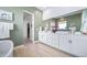 Stylish bathroom featuring dual vanity sinks and ample counter space at 5925 La Posada Pl, Parker, CO 80134