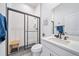 Modern bathroom with a sleek glass-enclosed shower and stylish vanity at 5925 La Posada Pl, Parker, CO 80134