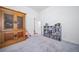 Spacious room with a vintage cabinet and a bookshelf for all your storage needs at 5925 La Posada Pl, Parker, CO 80134